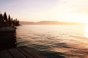 lake in rays of evening sun