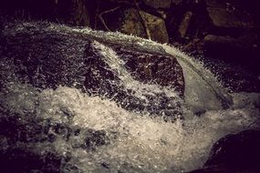 waterfall on stones macro view
