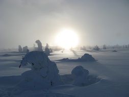 mountains in the snow in the sunshine