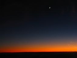 crescent and orange dawn