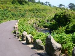 winding road on the jeju island in Korea