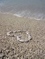 heart made of pebbles, love message