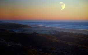 Landscape with the coast and Moon