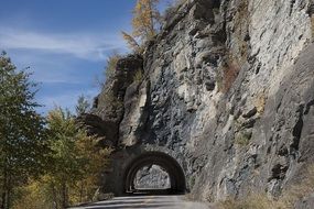 highway through a tunnel in the mountains of Montana