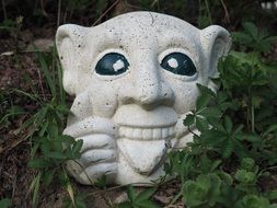 stone troll in the garden close up