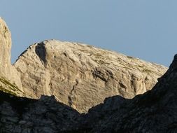 stone mountains under blue sky