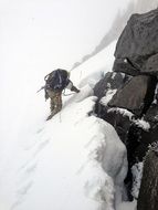 mountain climber snow rescue pack