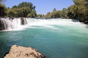 view of the waterfall on a sunny day