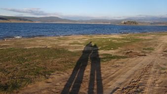 landscape of shadows of a couple outdoor