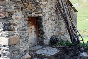 wooden door in a stone wooden building