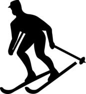 silhouette of a skier going down the hill