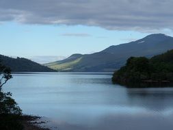 lake among the picturesque mountains in scotland