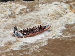 rafting boat in a stormy river