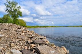 rocky shore at the blue river