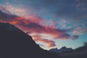 glow clouds and silhouettes mountains landscape