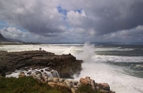 panoramic view of the rocky coast of south africa in the storm