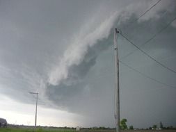 Storm clouds in the sky above the field