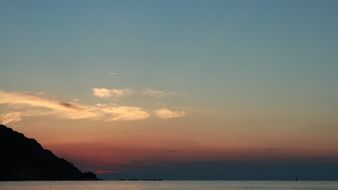 pink-blue sunset on the horizon above the sea