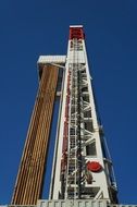 drilling rig at sky, natural gas search