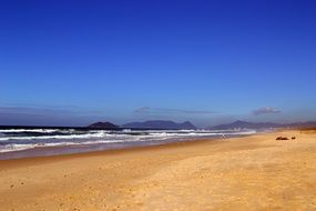 deserted sandy beach in brazil on a sunny day