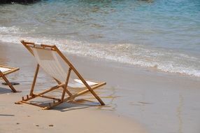 chair on the beach by the ocean