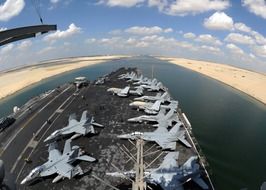 jet fighters on an aircraft carrier in the Suez Canal