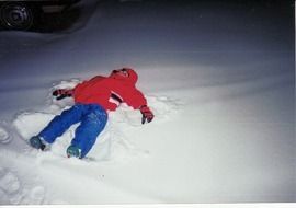 child in the snow like an angel