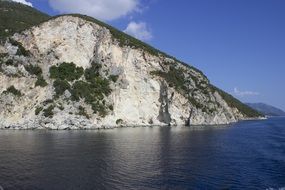 photo of rock on the seashore