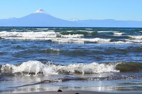 Osorno volcano at wavy lake, chile