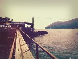 wooden bridge along the beach in Mallorca, Spain