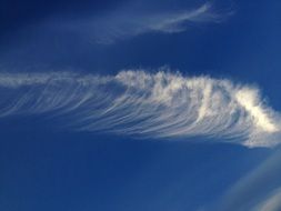 Wavy clouds in the blue sky
