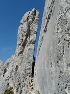 cliffs in the Alps in the background of blue sky