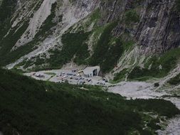 green foot of alpine mountain