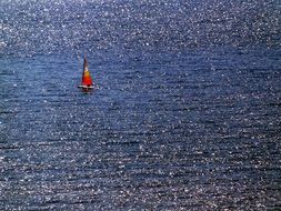 sailing boat on glossy water