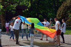 people playing wiyh colorful patch