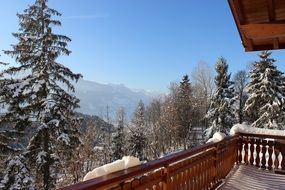 wooden chalet in the snowy mountains