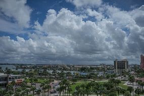 sunny clearwater beach with fluffy clouds