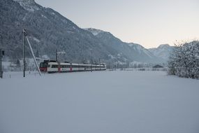 winter train on snow railway mountain landscape