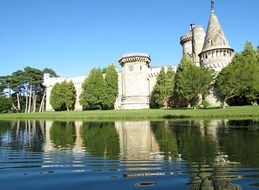 White Castle is reflected in the water in Austria