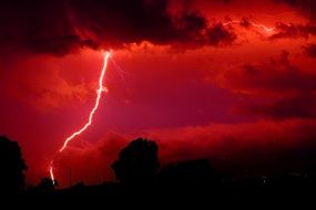 landscape of lightning strike in red sky