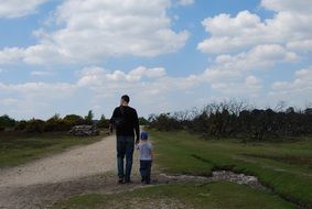 dad and son go on the road