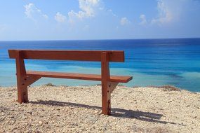 wooden bench on the beach