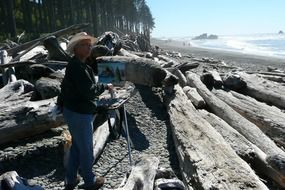 artist on ruby beach near the Pacific