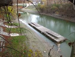 wooden platform on the river among the forest