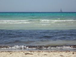 sailing boat on the horizon