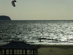 parasurfer at beach, distant view