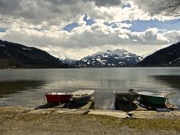 lonely boats at a mountain lake in austria
