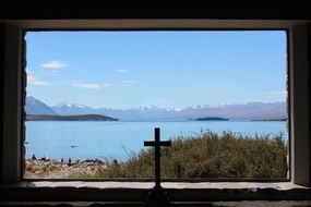 view of the cross from the church window