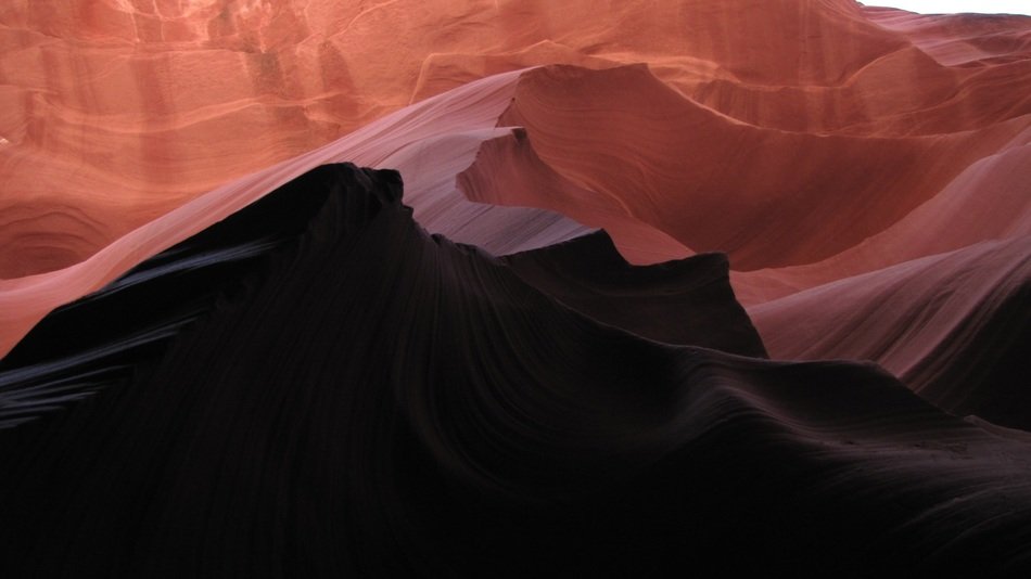 rock formations of red sandstone in the canyon in shadow and light