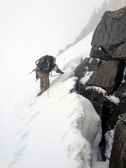 mountain climber snow rescue pack
